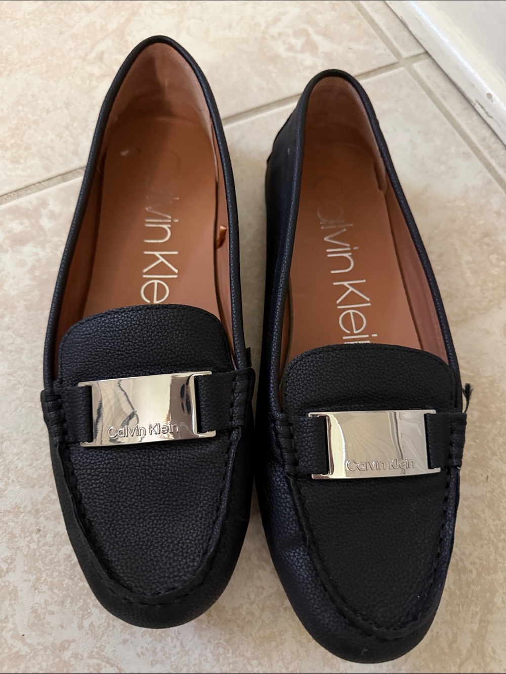 Calvin Klein Black Leather Loafers with Silver Plaque